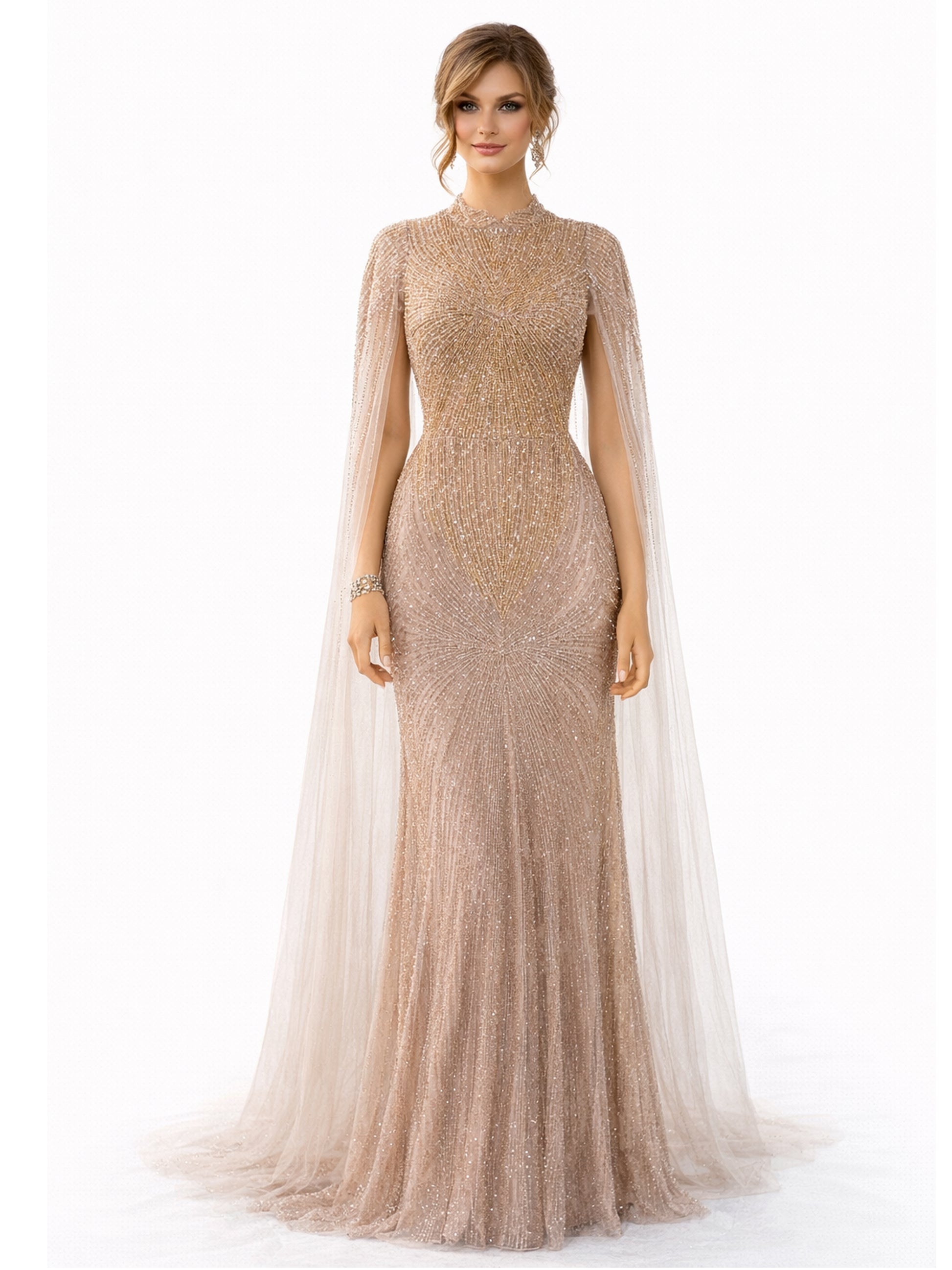 Woman wearing a long, sparkly gold dress with a cape on a white background